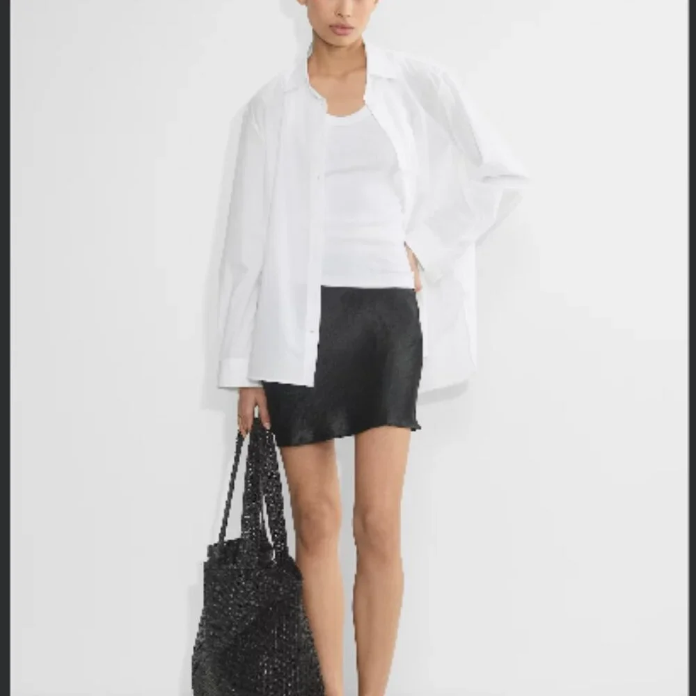 Aritzia Babaton Slip Satin Mini Skirt in Black - Picture 8 of 8